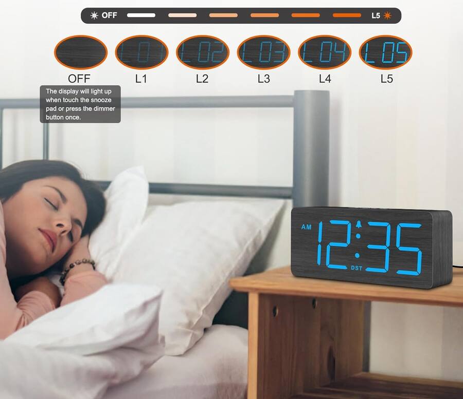 A wooden large screen displaying an alarm clock figurine