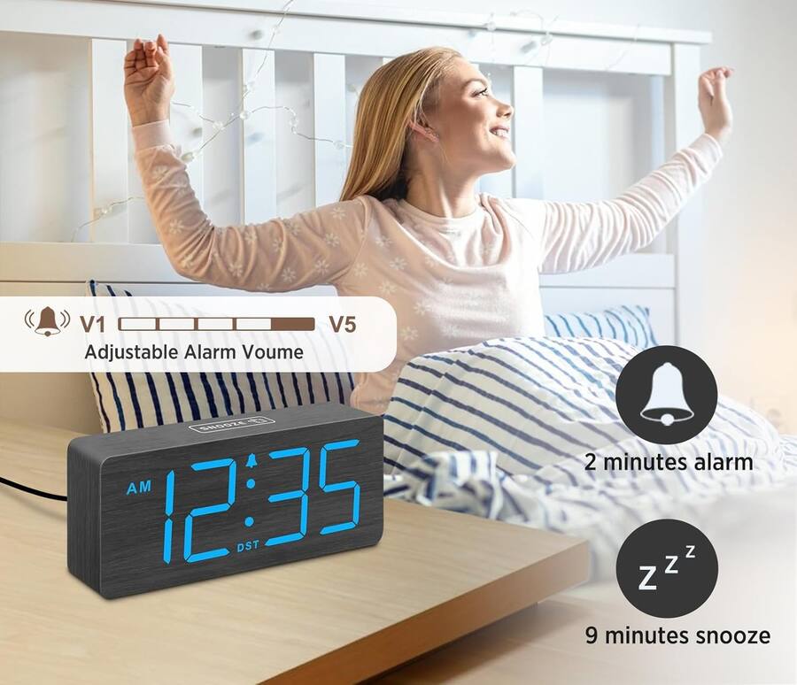 A wooden large screen displaying an alarm clock figurine