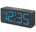 A wooden large screen displaying an alarm clock figurine